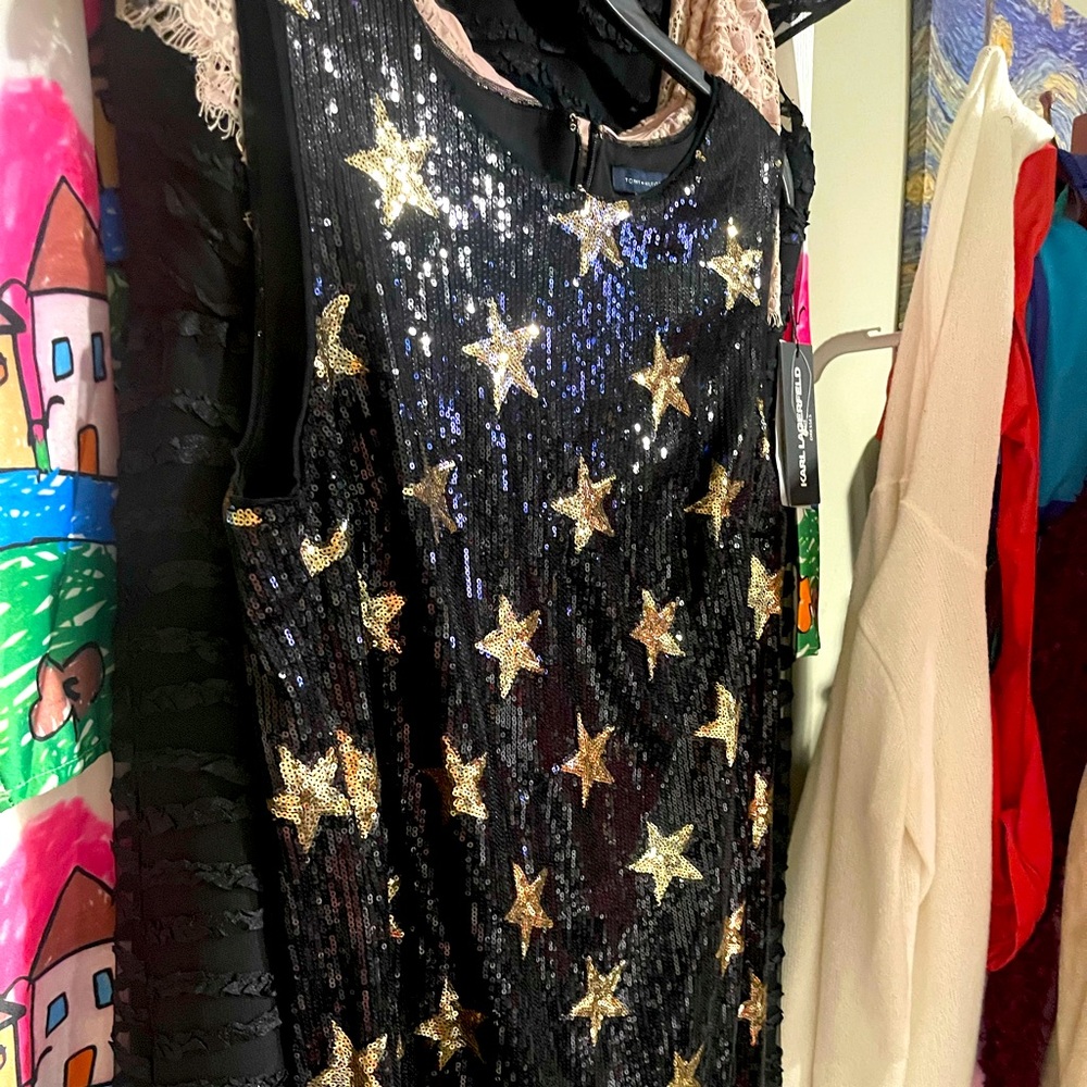 Brand new size 14 black dress with gold stars